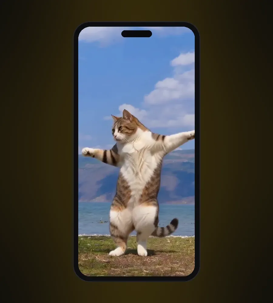 An AI cat dance video playing full screen on a phone: a tabby-and-white cat dancing upright by a lake